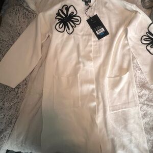 White Coat with Black Floral Accents